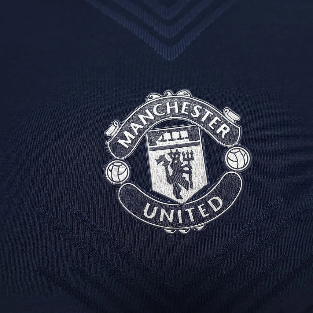 Kit pre-partita del Manchester United 2024/2025