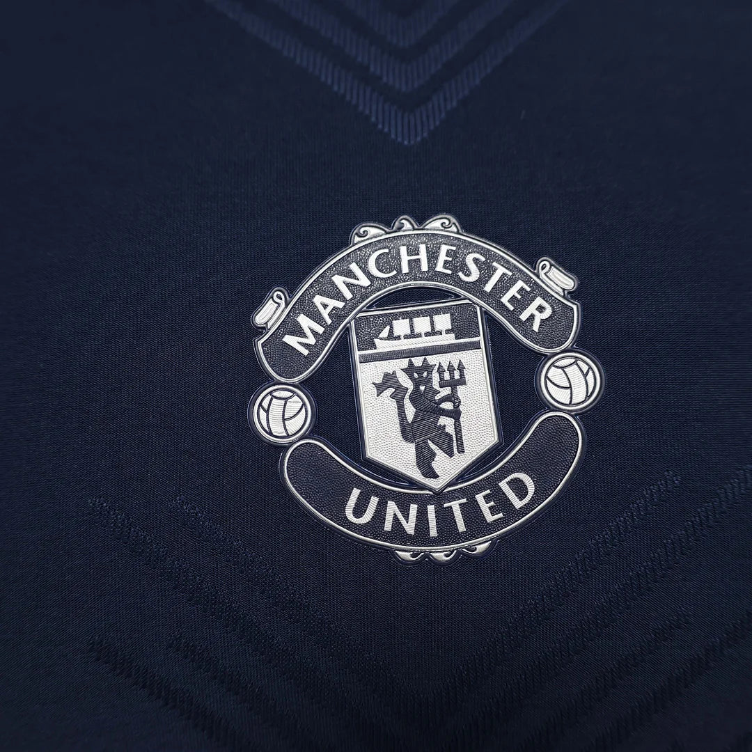 Kit pre-partita del Manchester United 2024/2025
