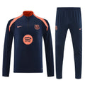 Tuta Barcellona blu e arancione 2025/2026