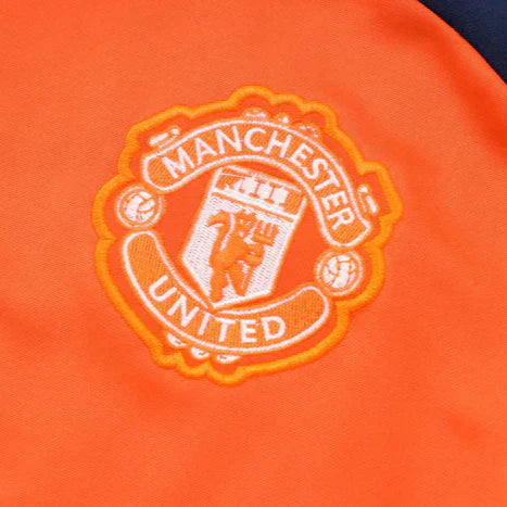 Tuta Manchester United blu scuro e arancione