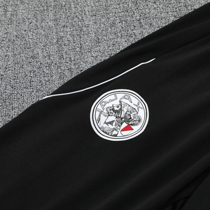 Tuta Ajax bianco e nero x rosso